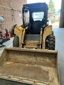 Minicargadora John Deere 317