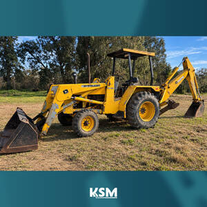 Pala y retro John Deere 310A (ID820)
