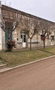 VENDE TERRENO DE 1322 M2 + CASA + LOCAL EN ANTONIO CARBONI - LOBOS (BA)